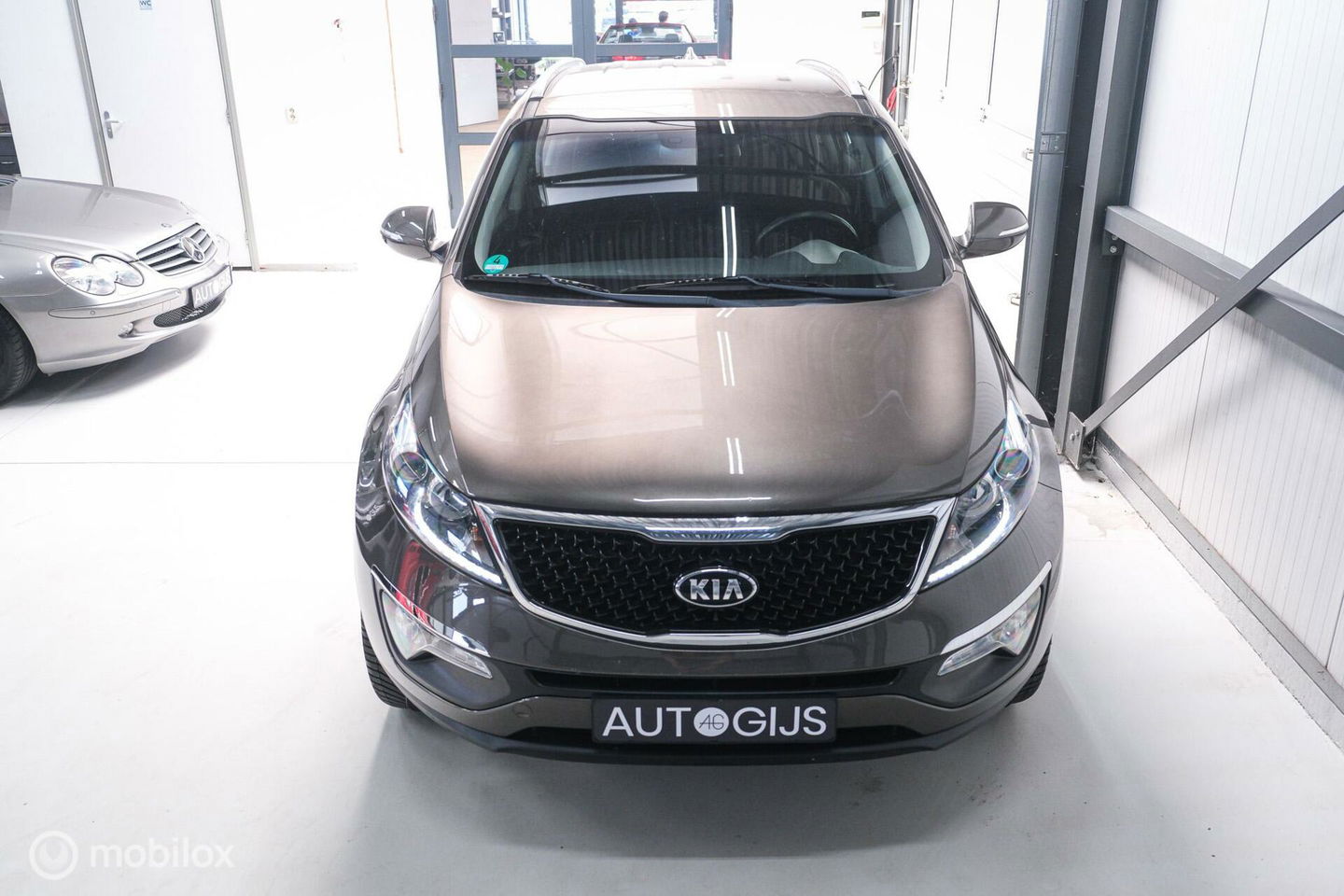 Kia Sportage 1.6 GDI BusinessLine | Trekhaak | Navigatie | Bluetooth | NL auto NAP | All season banden |