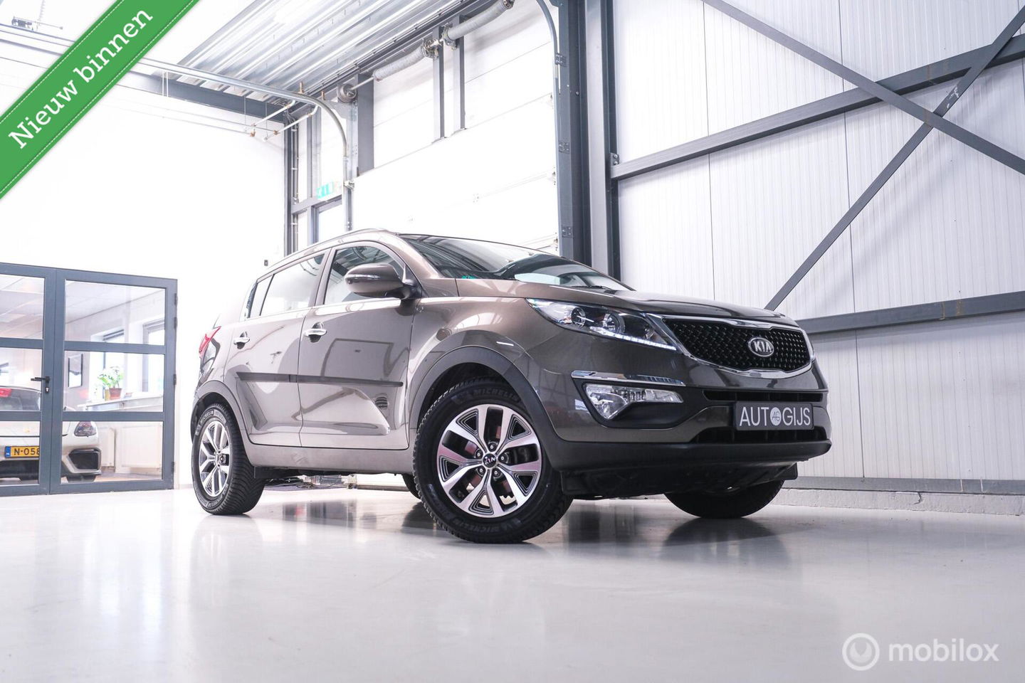 Kia Sportage 1.6 GDI BusinessLine | Trekhaak | Navigatie | Bluetooth | NL auto NAP | All season banden |