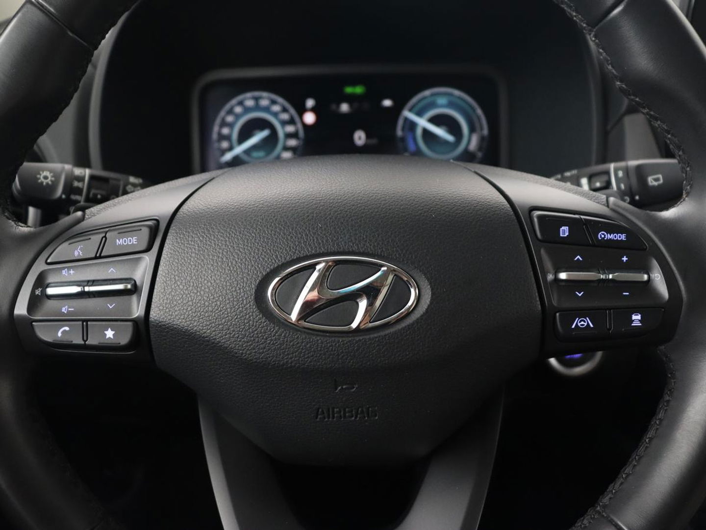 Hyundai KONA 1.6 GDI HEV Premium | Leder | Head-Up | Stoel & stuurverwarming | Adaptive cruise | Camera | Carplay | Keyless | Navigatie | Keyless | Full LED