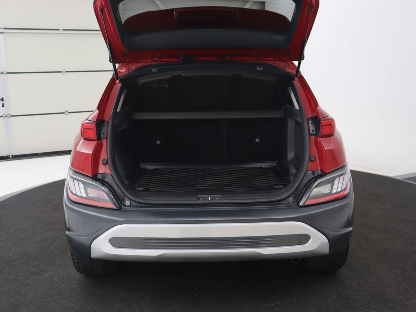 Hyundai KONA 1.6 GDI HEV Premium | Leder | Head-Up | Stoel & stuurverwarming | Adaptive cruise | Camera | Carplay | Keyless | Navigatie | Keyless | Full LED
