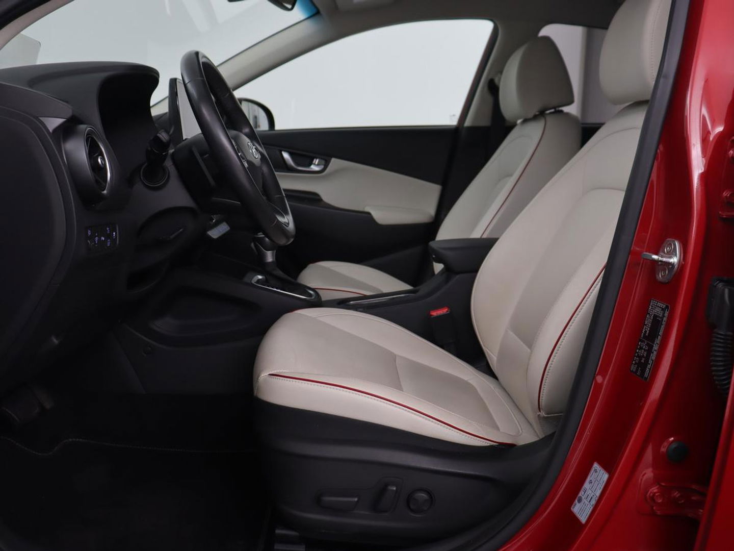 Hyundai KONA 1.6 GDI HEV Premium | Leder | Head-Up | Stoel & stuurverwarming | Adaptive cruise | Camera | Carplay | Keyless | Navigatie | Keyless | Full LED