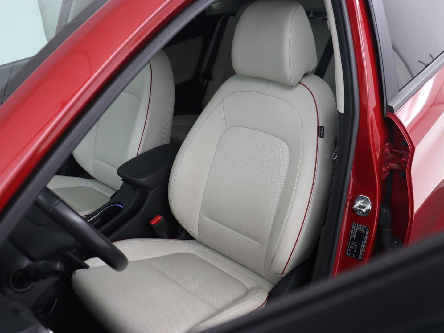 Hyundai KONA 1.6 GDI HEV Premium | Leder | Head-Up | Stoel & stuurverwarming | Adaptive cruise | Camera | Carplay | Keyless | Navigatie | Keyless | Full LED