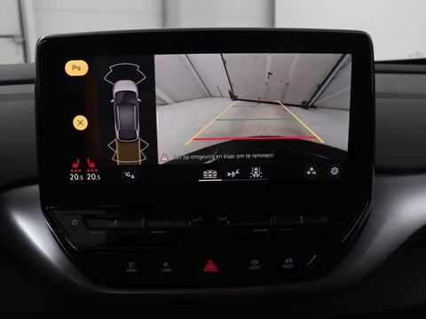Volkswagen ID.4 Life 77 kWh | Trekhaak | Stoel & stuurverwarming | Camera | Adaptive cruise | Carplay | Navigatie | Parkeerhulp | Half leder