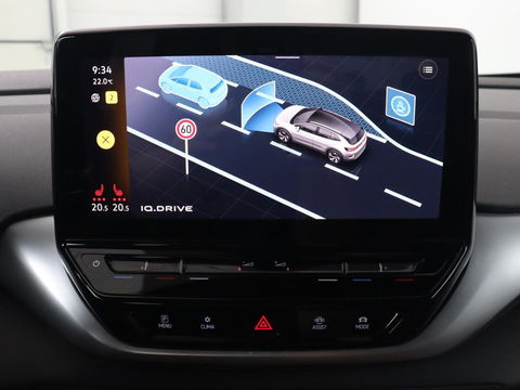 Volkswagen ID.4 Life 77 kWh | Trekhaak | Stoel & stuurverwarming | Camera | Adaptive cruise | Carplay | Navigatie | Parkeerhulp | Half leder