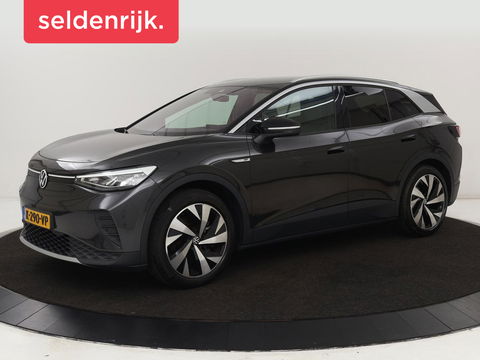 Volkswagen ID.4 Life 77 kWh | Trekhaak | Stoel & stuurverwarming | Camera | Adaptive cruise | Carplay | Navigatie | Parkeerhulp | Half leder