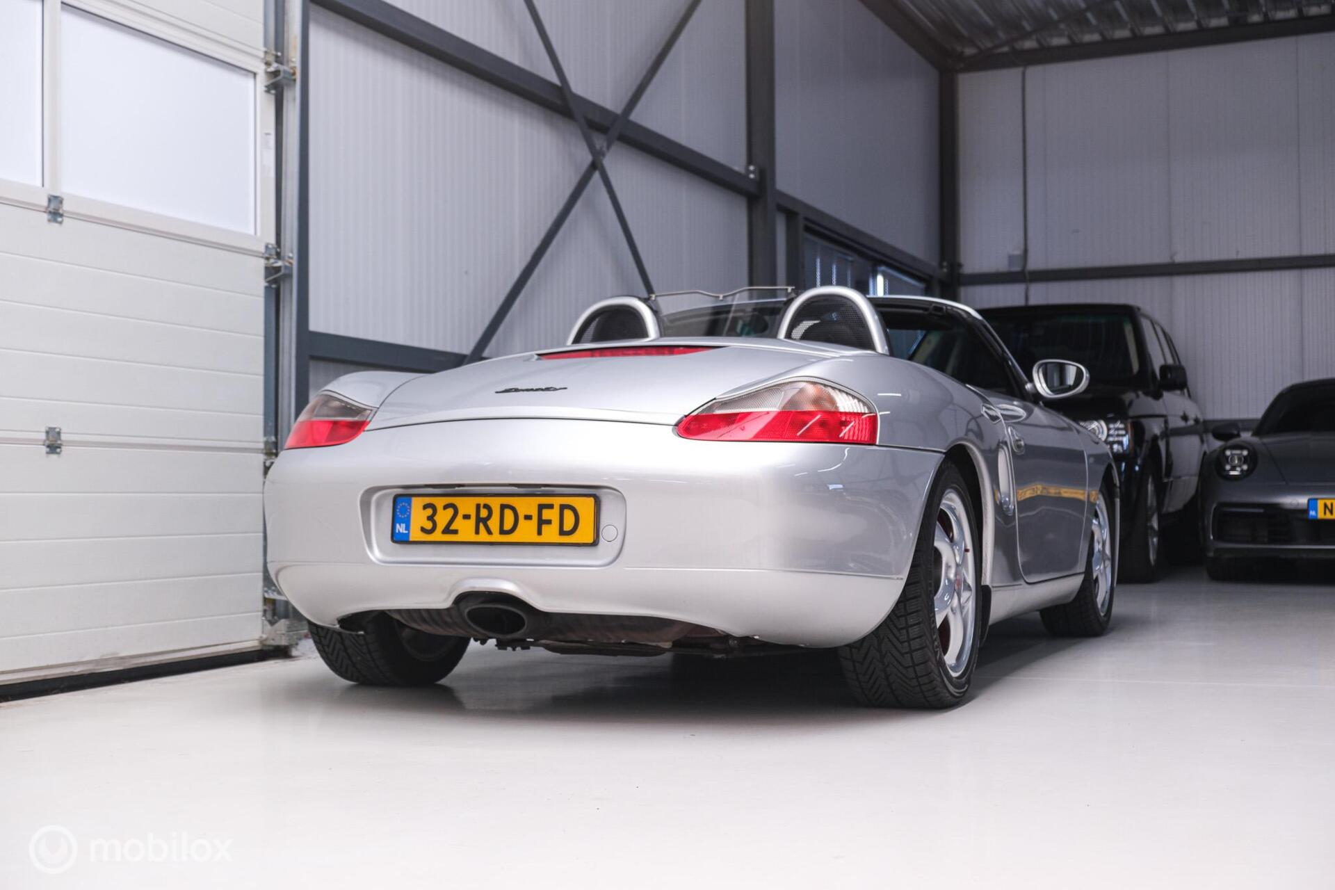 Porsche Boxster 2.5 Handgeschakeld | Nieuwe koppeling + dak | Climate control | Cruise | Facelift lampen | Rijklaar |