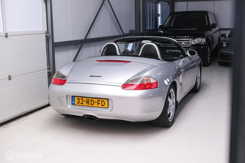 Porsche Boxster 2.5 Handgeschakeld | Nieuwe koppeling + dak | Climate control | Cruise | Facelift lampen | Rijklaar |