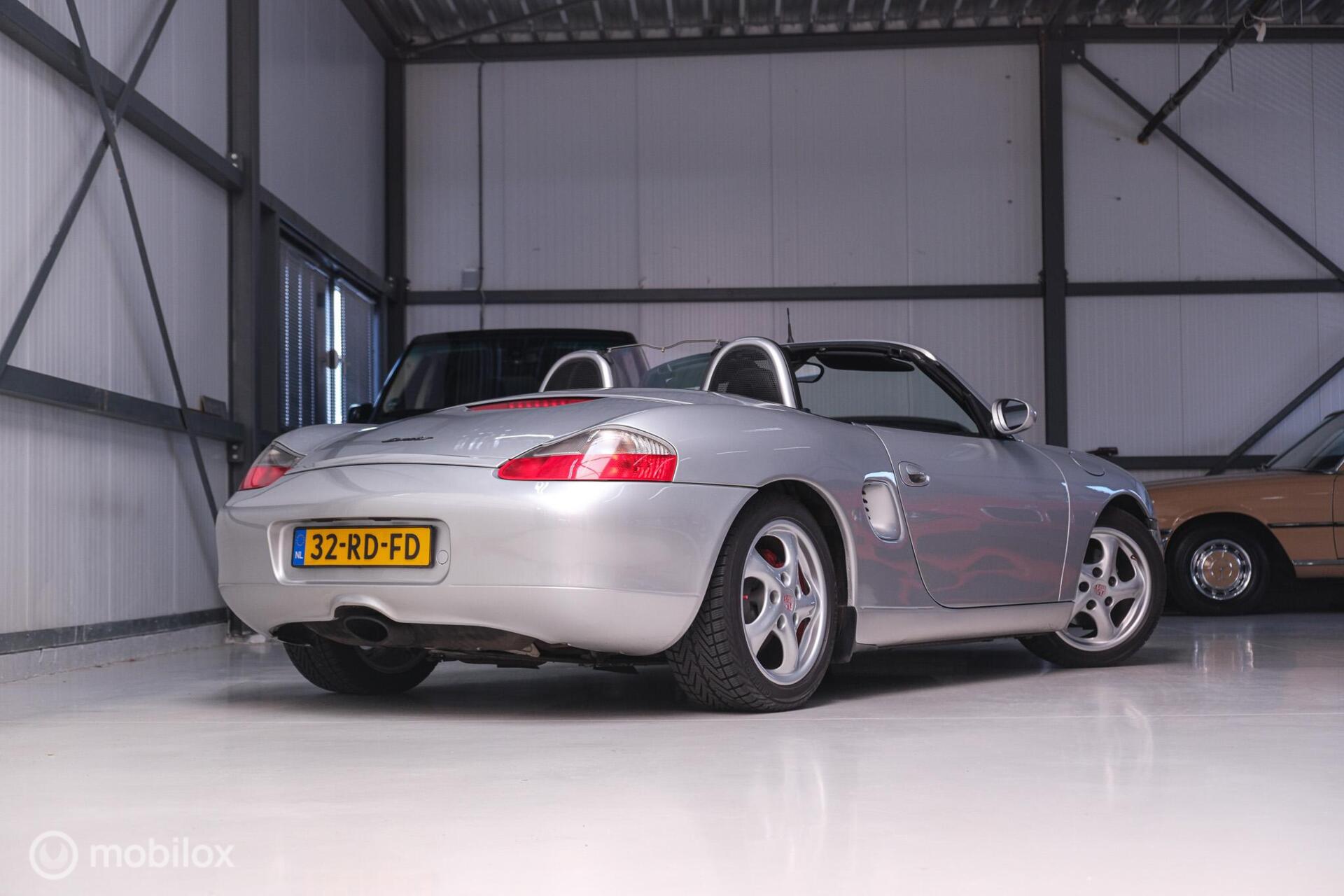 Porsche Boxster 2.5 Handgeschakeld | Nieuwe koppeling + dak | Climate control | Cruise | Facelift lampen | Rijklaar |