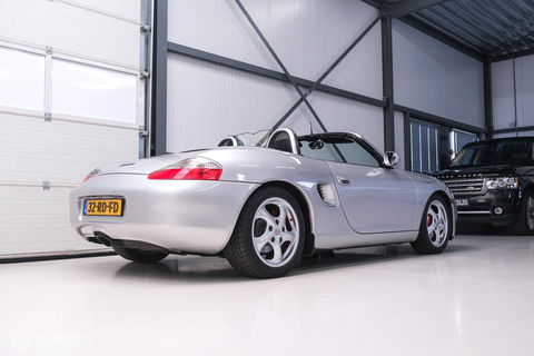 Porsche Boxster 2.5 Handgeschakeld | Nieuwe koppeling + dak | Climate control | Cruise | Facelift lampen | Rijklaar |