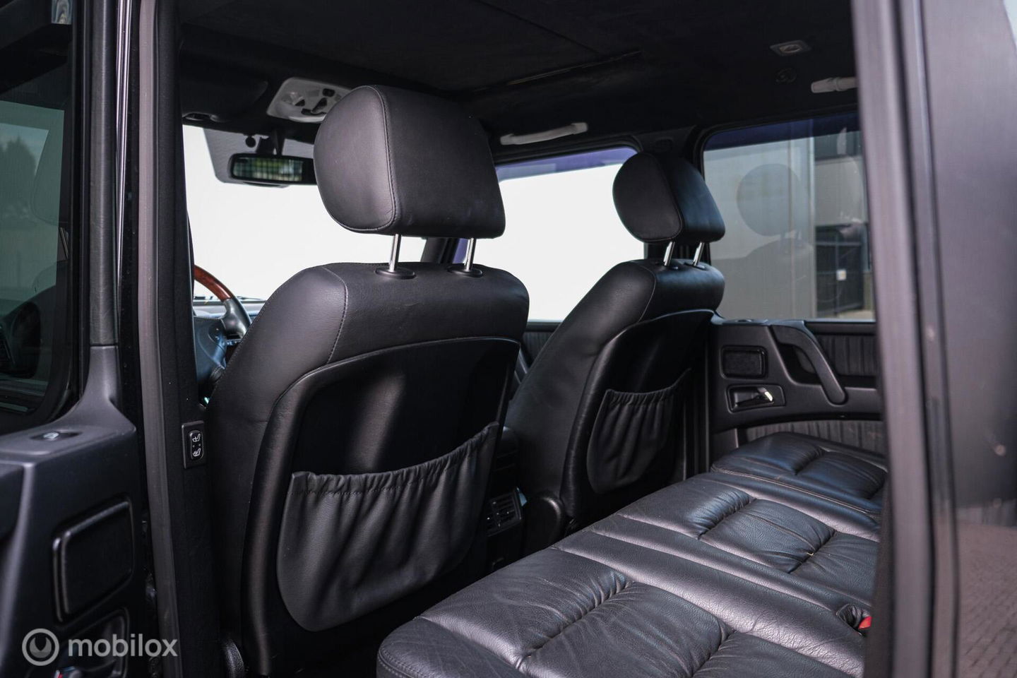 Mercedes-Benz G-Klasse 500 St.Wagon | CarPlay | Camera | Youngtimer | Trekhaak | Alcantara hemel | Rijklaar |