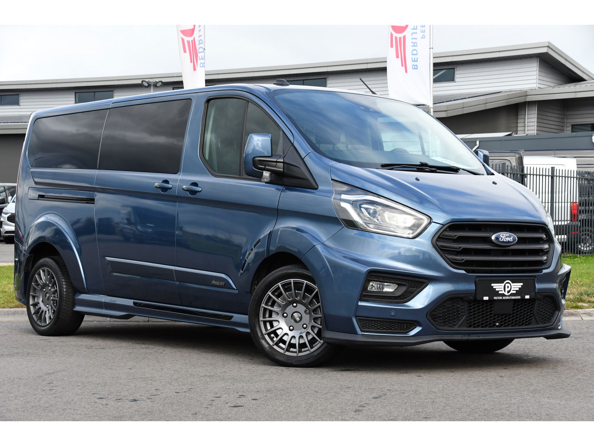 Ford Transit Custom 320 2.0 TDCI L2H1 MS-RT DC Full Options! Adaptieve Cruise, Camera, Carplay, 185PK, Xenon, Automaat, Leder, Stoelverwarming, Trekhaak, Uniek!