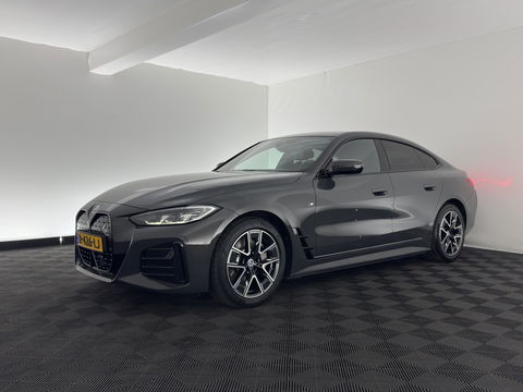 BMW i4 eDrive40 84 kWh M-Sportpack [ 3-Fase ] { SOH-95%} (INCL-BTW) *LEATHER-ALCANTARA | FULL-LED | ADAPTIVE-CRUISE | WIDE-SCREEN-DIGI-COCKPIT | DAB+ | CAMERA | AMBIENT-LIGHT | CARPLAY | SPORT-SEATS | PRIVACY-GLASS | TOWBAR | 18''ALU*