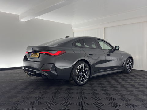 BMW i4 eDrive40 84 kWh M-Sportpack [ 3-Fase ] { SOH-95%} (INCL-BTW) *LEATHER-ALCANTARA | FULL-LED | ADAPTIVE-CRUISE | WIDE-SCREEN-DIGI-COCKPIT | DAB+ | CAMERA | AMBIENT-LIGHT | CARPLAY | SPORT-SEATS | PRIVACY-GLASS | TOWBAR | 18''ALU*