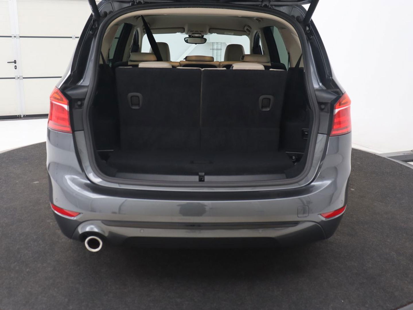 BMW 2 Serie Gran Tourer 218i High Executive Edition | 7-persoons | Automaat | Camera | Sfeerverlichting | Carplay | Cruise Control | Stoelverwarming | LED | Leder | Climate controle