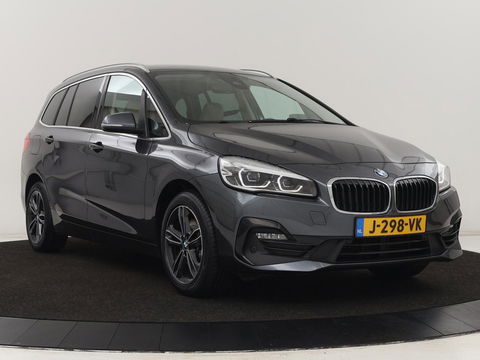 BMW 2 Serie Gran Tourer 218i High Executive Edition | 7-persoons | Automaat | Camera | Sfeerverlichting | Carplay | Cruise Control | Stoelverwarming | LED | Leder | Climate controle