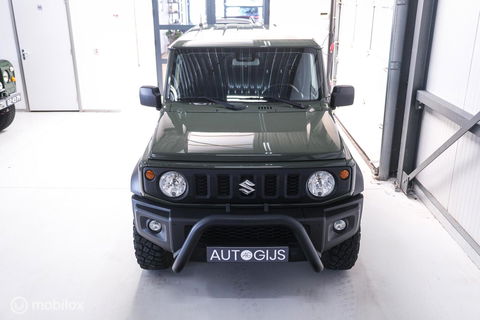Suzuki Jimny 1.5 All Grip 4x4 | CarPlay | Camera | Stoelverwarming | BF Goodrich | Frontrunner | NL auto NAP | Groen | Lane Assist |