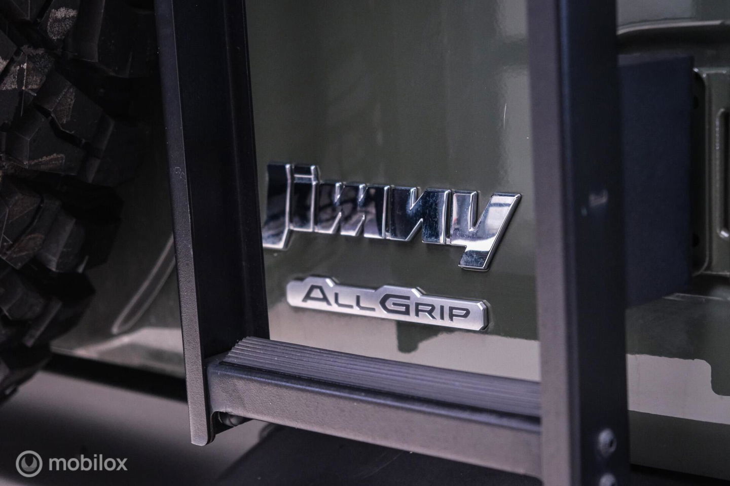 Suzuki Jimny 1.5 All Grip 4x4 | CarPlay | Camera | Stoelverwarming | BF Goodrich | Frontrunner | NL auto NAP | Groen | Lane Assist |