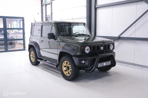 Suzuki Jimny 1.5 All Grip 4x4 | CarPlay | Camera | Stoelverwarming | BF Goodrich | Frontrunner | NL auto NAP | Groen | Lane Assist |