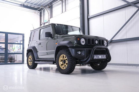 Suzuki Jimny 1.5 All Grip 4x4 | CarPlay | Camera | Stoelverwarming | BF Goodrich | Frontrunner | NL auto NAP | Groen | Lane Assist |