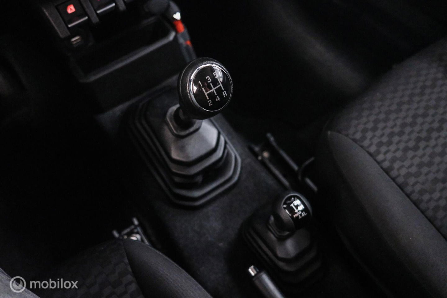 Suzuki Jimny 1.5 All Grip 4x4 | CarPlay | Camera | Stoelverwarming | BF Goodrich | Frontrunner | NL auto NAP | Groen | Lane Assist |