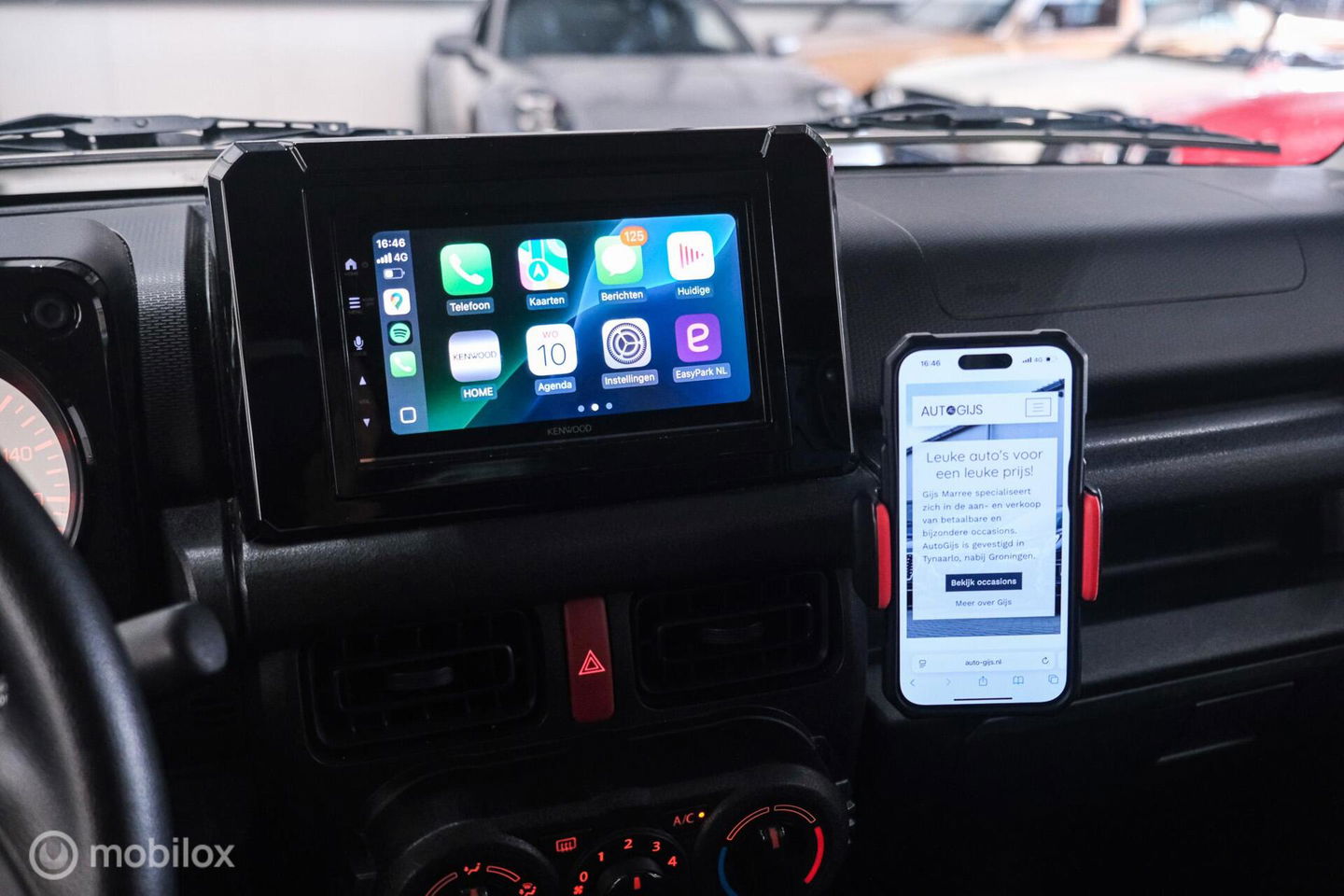 Suzuki Jimny 1.5 All Grip 4x4 | CarPlay | Camera | Stoelverwarming | BF Goodrich | Frontrunner | NL auto NAP | Groen | Lane Assist |