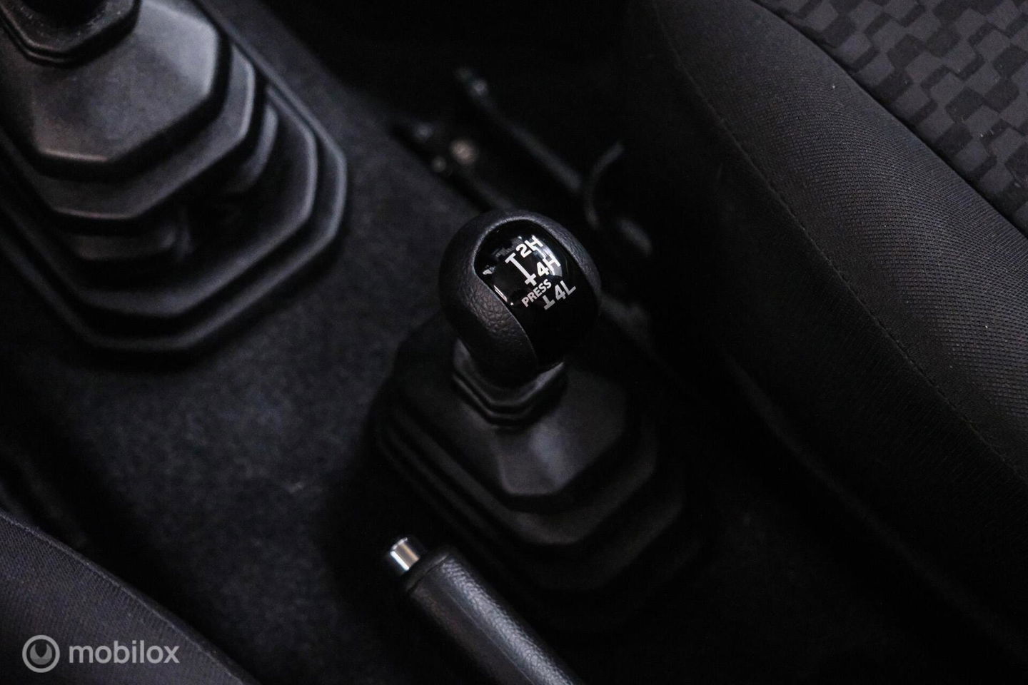 Suzuki Jimny 1.5 All Grip 4x4 | CarPlay | Camera | Stoelverwarming | BF Goodrich | Frontrunner | NL auto NAP | Groen | Lane Assist |