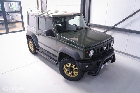 Suzuki Jimny 1.5 All Grip 4x4 | CarPlay | Camera | Stoelverwarming | BF Goodrich | Frontrunner | NL auto NAP | Groen | Lane Assist |