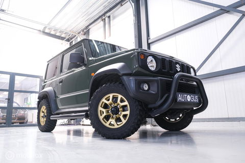 Suzuki Jimny 1.5 All Grip 4x4 | CarPlay | Camera | Stoelverwarming | BF Goodrich | Frontrunner | NL auto NAP | Groen | Lane Assist |