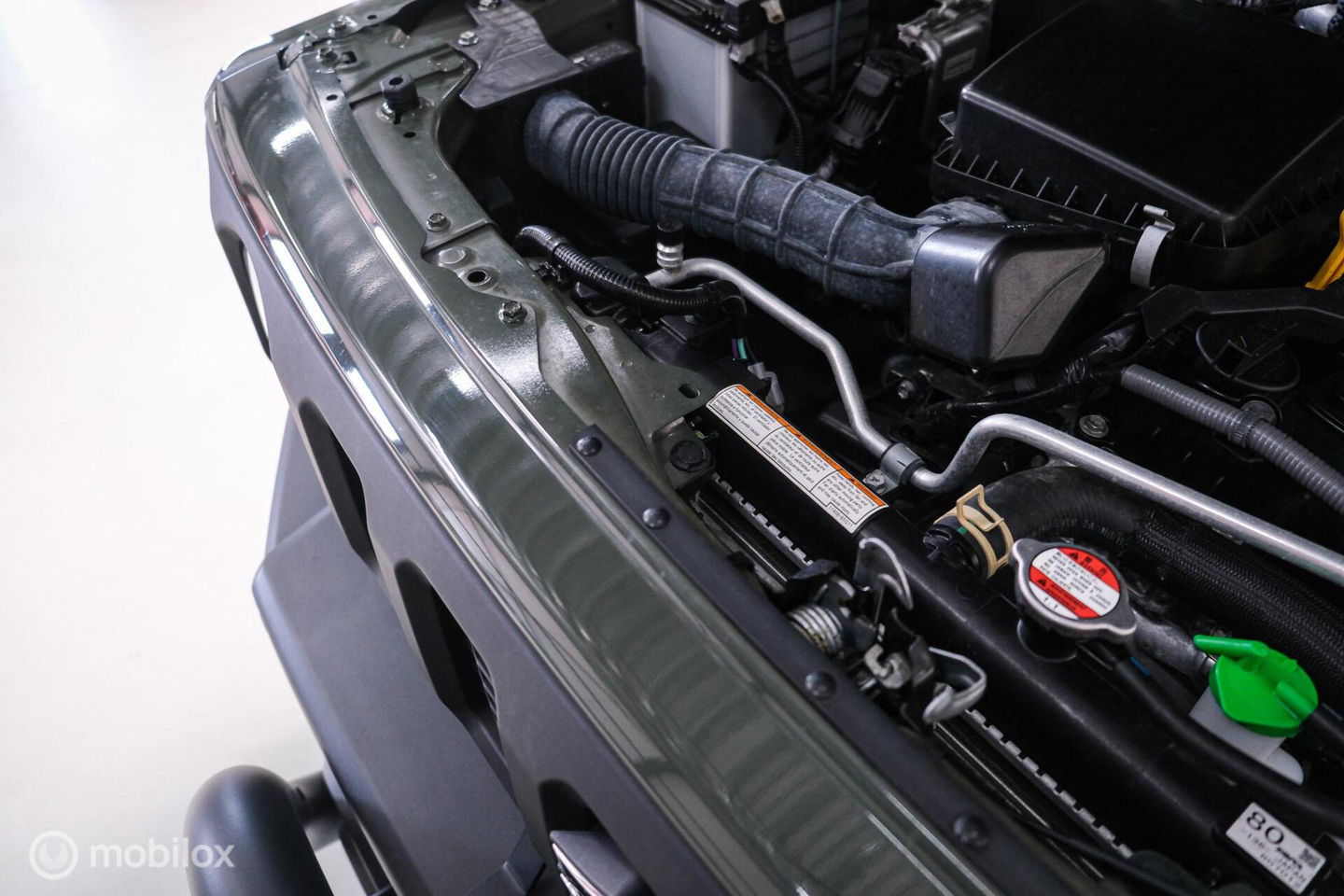 Suzuki Jimny 1.5 All Grip 4x4 | CarPlay | Camera | Stoelverwarming | BF Goodrich | Frontrunner | NL auto NAP | Groen | Lane Assist |