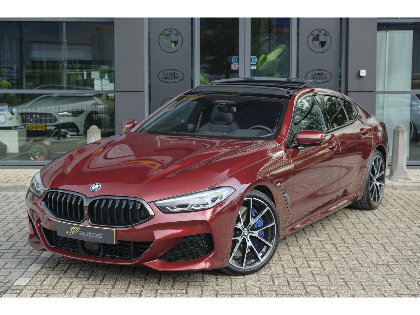 BMW 8 Serie Gran Coupé 840i 333pk M-sport xDrive Panoramadak M8 seats Bowers&Wilkins Stoelkoeling Aventurin Rot 20" LMV