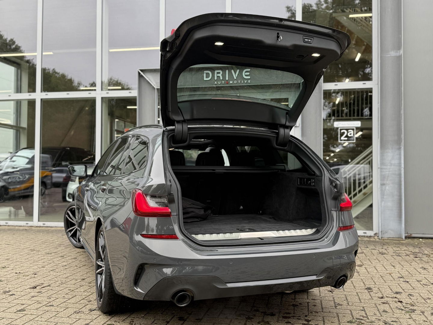 BMW 3 Serie Touring 330e High Ex. M-sport plus|SOH98%|Pano|Laser|CoPilot|HiFi|Trekhaak|Dravit grey