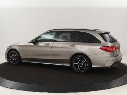 Mercedes-Benz C-Klasse 200 Business Solution AMG | Leder | Carplay | Navigatie | Stoelverwarming | Camera | Adaptive cruise | Full LED | LMV 18 inch