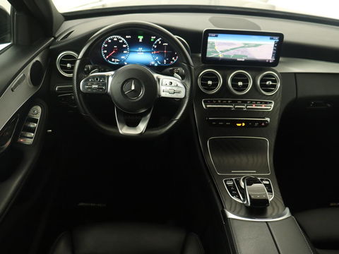Mercedes-Benz C-Klasse 200 Business Solution AMG | Leder | Carplay | Navigatie | Stoelverwarming | Camera | Adaptive cruise | Full LED | LMV 18 inch