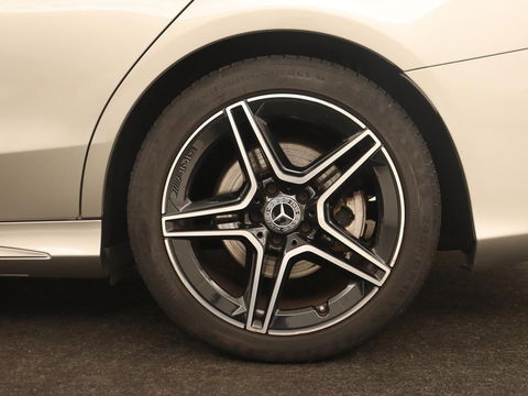 Mercedes-Benz C-Klasse 200 Business Solution AMG | Leder | Carplay | Navigatie | Stoelverwarming | Camera | Adaptive cruise | Full LED | LMV 18 inch