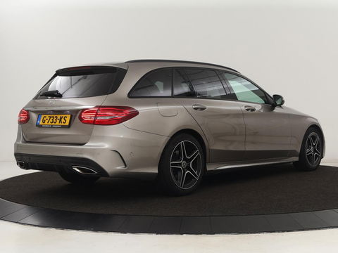 Mercedes-Benz C-Klasse 200 Business Solution AMG | Leder | Carplay | Navigatie | Stoelverwarming | Camera | Adaptive cruise | Full LED | LMV 18 inch