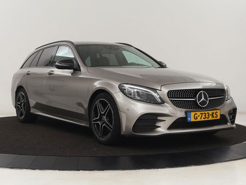 Mercedes-Benz C-Klasse 200 Business Solution AMG | Leder | Carplay | Navigatie | Stoelverwarming | Camera | Adaptive cruise | Full LED | LMV 18 inch