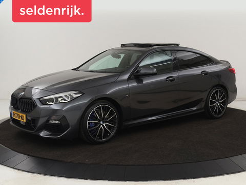 BMW 2 Serie 218i M Sport | Panoramadak | Sportstoelen | Leder | Camera | Carplay | Live Cockpit | Stoelverwarming | Getint glas | Navigatie | Climate control | Full LED