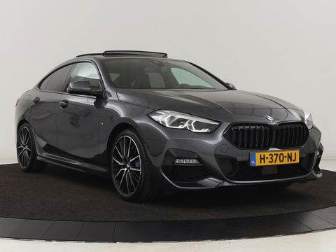 BMW 2 Serie 218i M Sport | Panoramadak | Sportstoelen | Leder | Camera | Carplay | Live Cockpit | Stoelverwarming | Getint glas | Navigatie | Climate control | Full LED