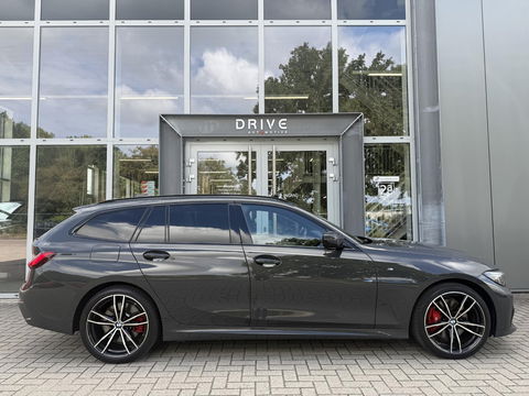 BMW 3 Serie Touring 330e Bus. Ed Plus M-Sport|SOH89%|Pano|Laser|HUD|Leer|Hifi|Trekhaak|Dravit grey