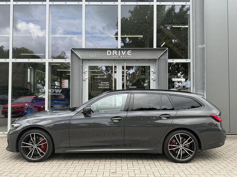 BMW 3 Serie Touring 330e Bus. Ed Plus M-Sport|SOH89%|Pano|Laser|HUD|Leer|Hifi|Trekhaak|Dravit grey