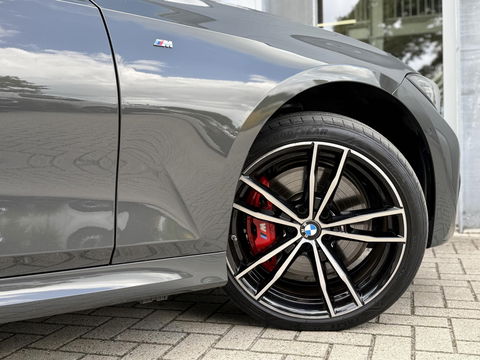 BMW 3 Serie Touring 330e Bus. Ed Plus M-Sport|SOH89%|Pano|Laser|HUD|Leer|Hifi|Trekhaak|Dravit grey