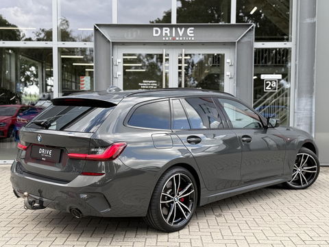 BMW 3 Serie Touring 330e Bus. Ed Plus M-Sport|SOH89%|Pano|Laser|HUD|Leer|Hifi|Trekhaak|Dravit grey