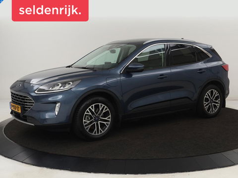 Ford Kuga 2.5 PHEV Titanium X | Trekhaak | Stoelverwarming | Camera | Carplay | Half leder | Achterbankverwarming | Navigatie | Full LED | Climate control | Parkeerhulp | Keyless | B&O Sound | Plug In