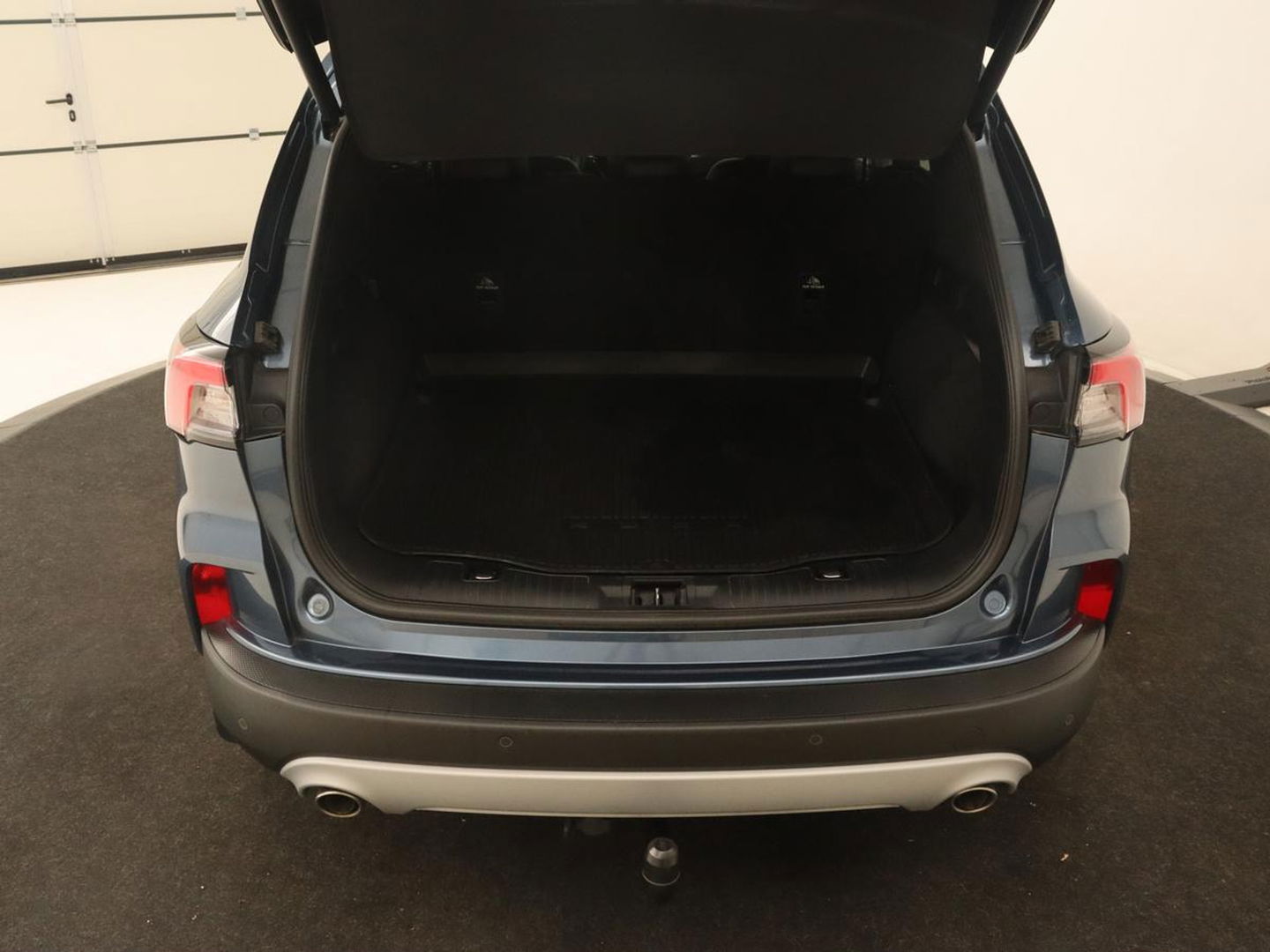 Ford Kuga 2.5 PHEV Titanium X | Trekhaak | Stoelverwarming | Camera | Carplay | Half leder | Achterbankverwarming | Navigatie | Full LED | Climate control | Parkeerhulp | Keyless | B&O Sound | Plug In