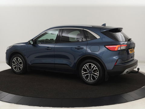 Ford Kuga 2.5 PHEV Titanium X | Trekhaak | Stoelverwarming | Camera | Carplay | Half leder | Achterbankverwarming | Navigatie | Full LED | Climate control | Parkeerhulp | Keyless | B&O Sound | Plug In