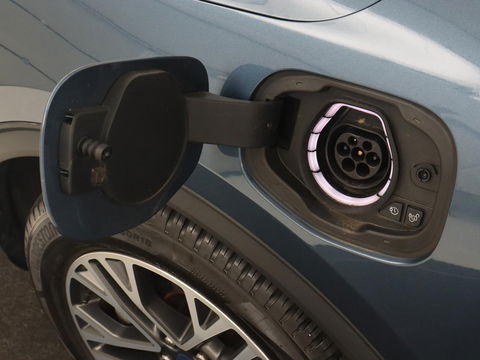 Ford Kuga 2.5 PHEV Titanium X | Trekhaak | Stoelverwarming | Camera | Carplay | Half leder | Achterbankverwarming | Navigatie | Full LED | Climate control | Parkeerhulp | Keyless | B&O Sound | Plug In