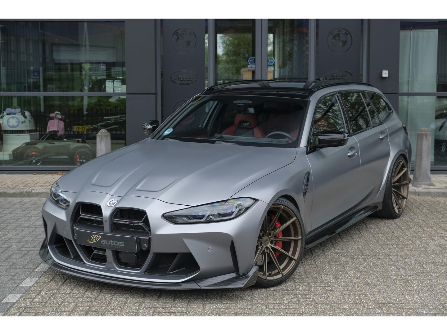 BMW M3 Touring Competition 510pk xDrive Widescreen Frozen grey *BTW* Head-up Adaptive cruise CSL grille 21" LMV