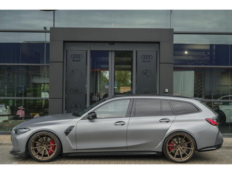 BMW M3 Touring Competition 510pk xDrive Widescreen Frozen grey *BTW* Head-up Adaptive cruise CSL grille 21" LMV
