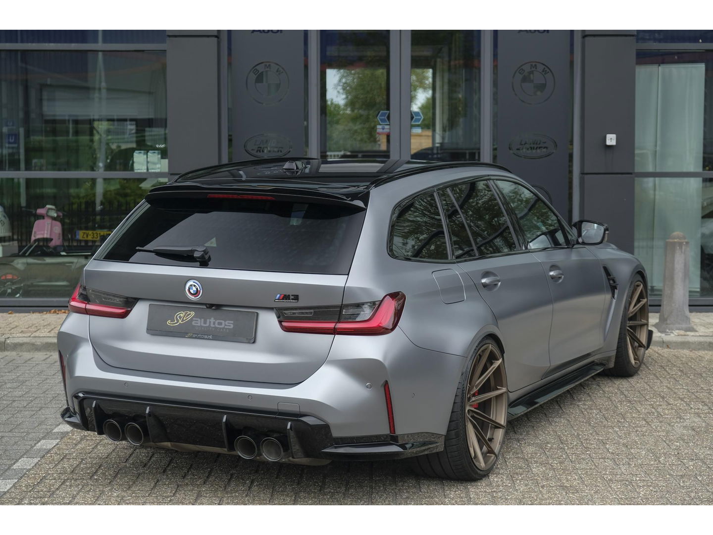 BMW M3 Touring Competition 510pk xDrive Widescreen Frozen grey *BTW* Head-up Adaptive cruise CSL grille 21" LMV