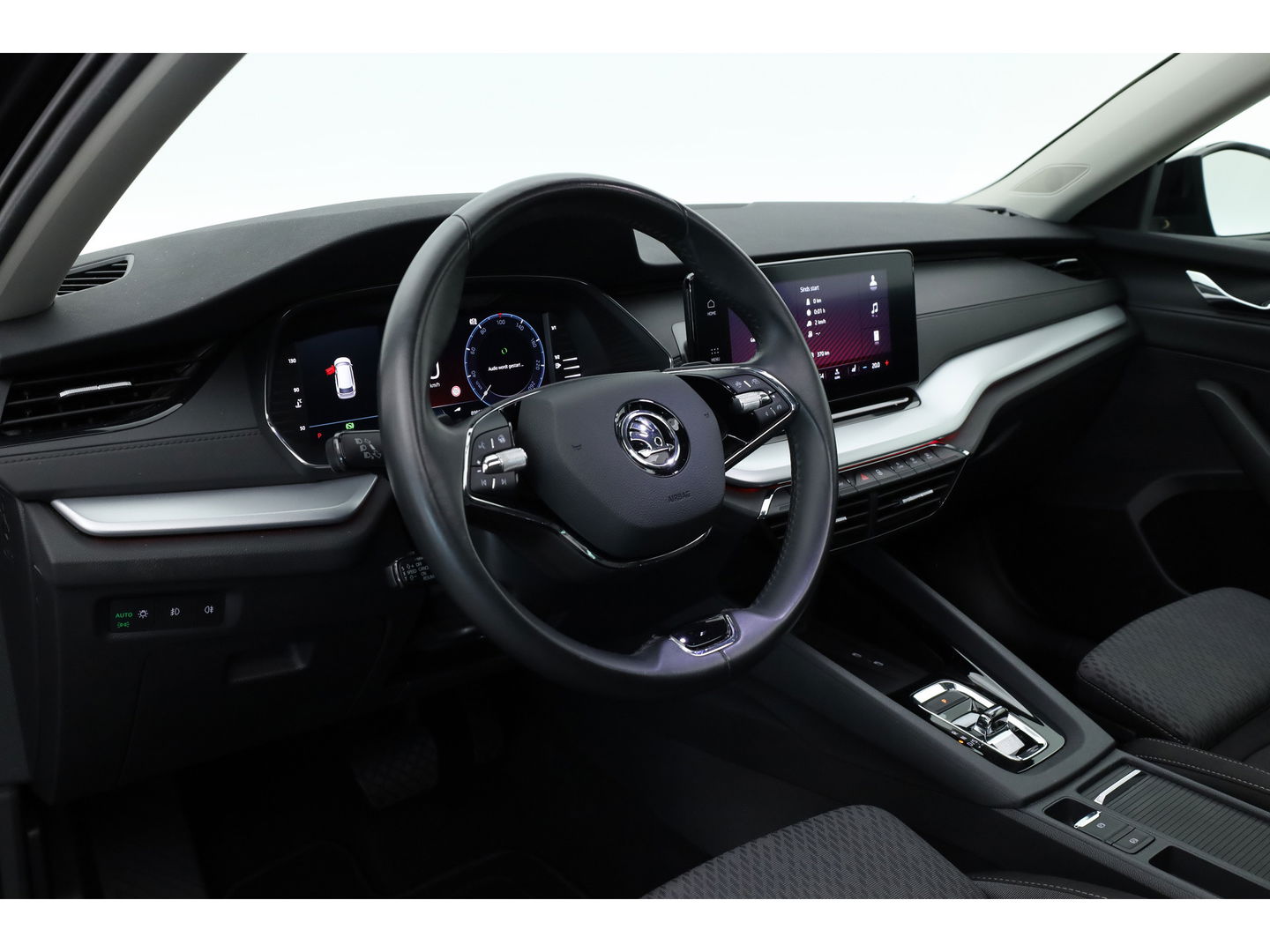 Škoda Octavia Combi 1.5 e-TSI Sport Business | Adapt. Cruise | Pano | CarPlay | Massage | Keyless | Trekhaak 1500 kg  | 4 Seasons